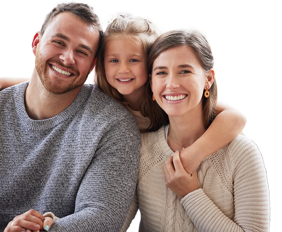 Happy couple with daughter smiling towards camera.